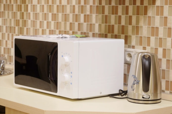 Close-up,Microwave,And,Stainless,Electric,Kettle