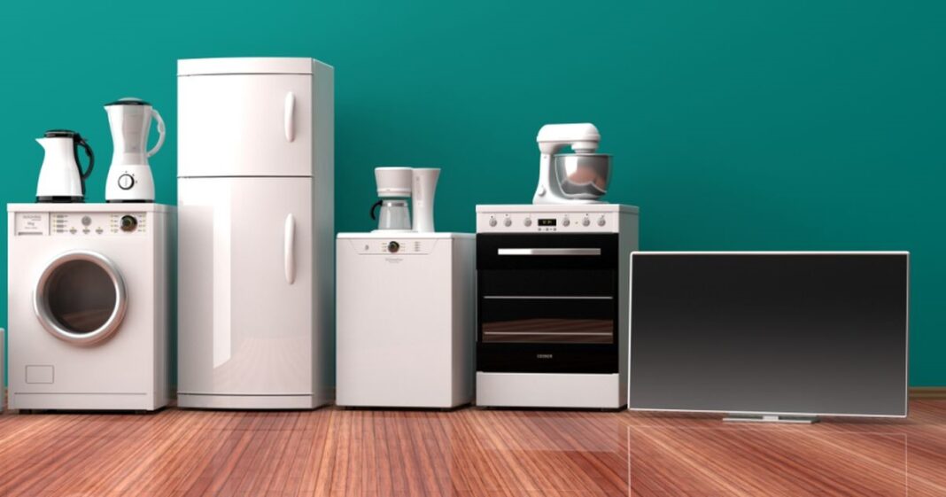 Set,Of,White,Home,Appliances,On,A,Wooden,Floor.,3d