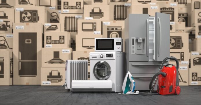 Household,Appliances,And,Kitchen,Electronics,In,Cardboard,Boxes,In,Warehouse.