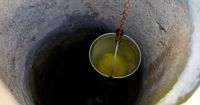 Metal,Bucket,In,Draw-well,In,European,Village.,Retro,Stone,Water