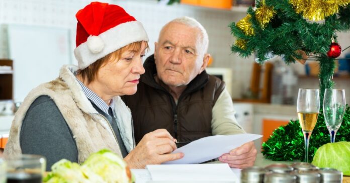 Aged,Family,Couple,Worried,About,Their,Finances,,Analyzing,Documents,At Mennyit költünk karácsonyra idén?