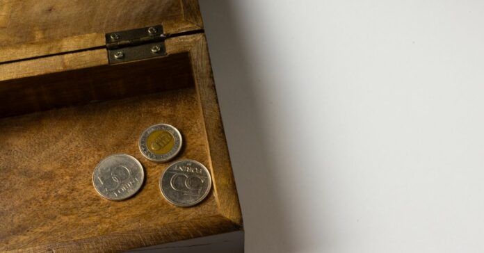 Hungarian forint coins in a chest szegénység Magyarországon